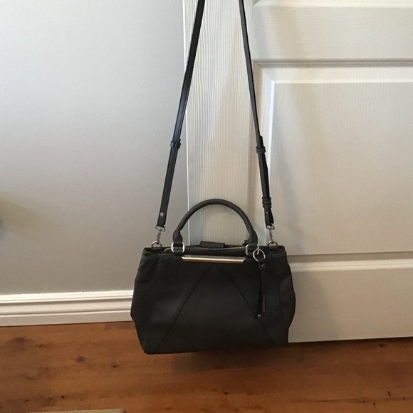 Looks like leather, but isn’t handbag.  -5 - Picture 2 of 7